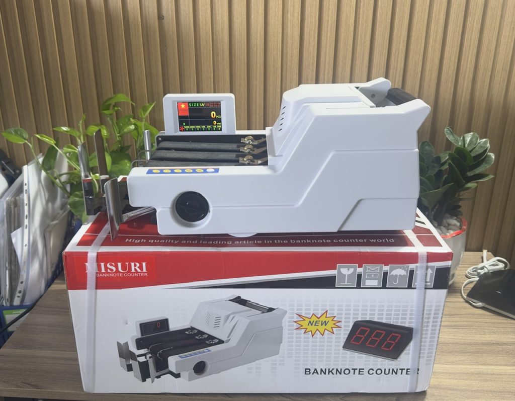 ban-máy-tien-bau-bàng-hoang-tin